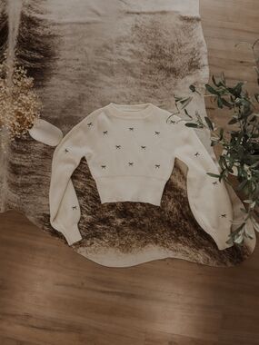 Altar'd State Cream Cropped Crewneck Sweater with Black Bow Embroidery
